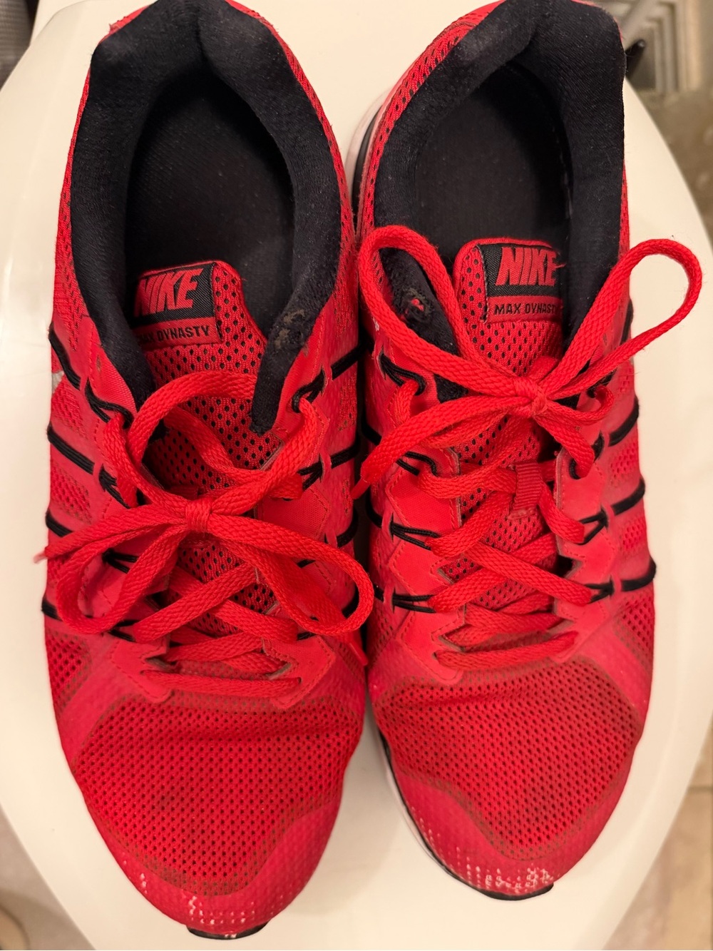 red Nike trainers